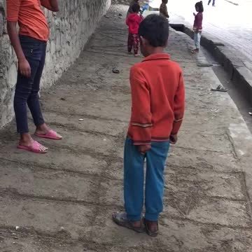 No luxury toys , no boundary but kids enjoying the simple game .