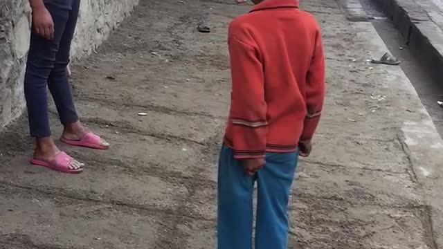 No luxury toys , no boundary but kids enjoying the simple game .