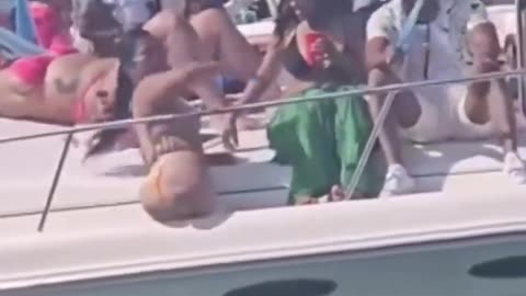 Legless woman twerking on boat