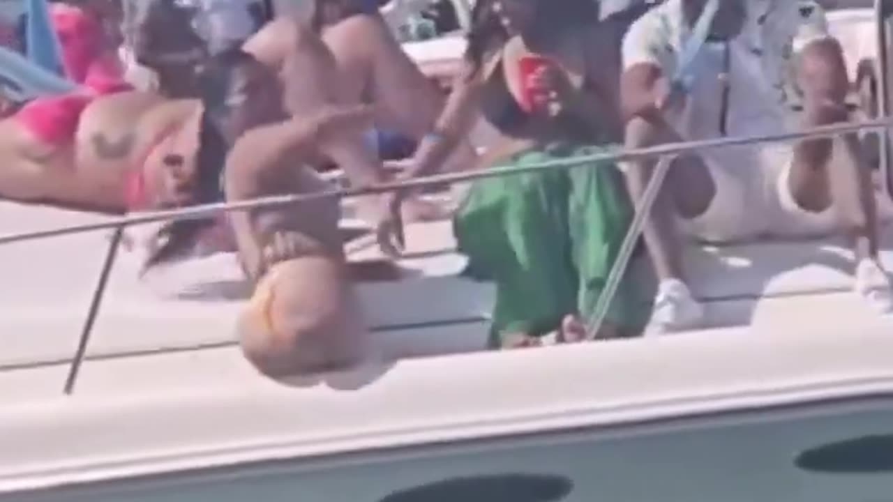 Legless woman twerking on boat