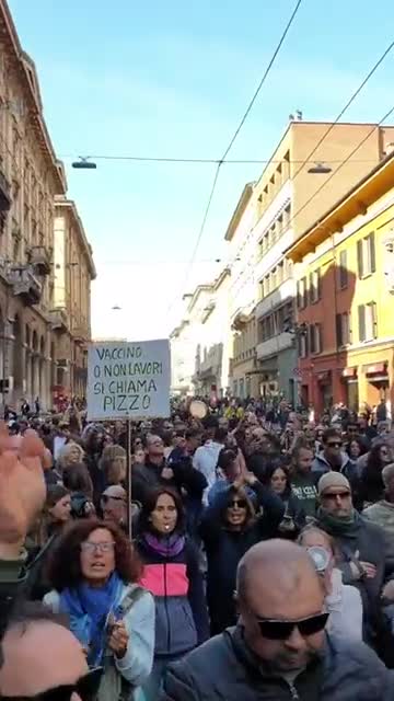 Thousands of people protesting against mandatory COVID passports in Italy