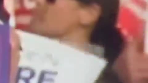 Woman standing behind Donald Trump during the assassination attempt appears highly suspicious