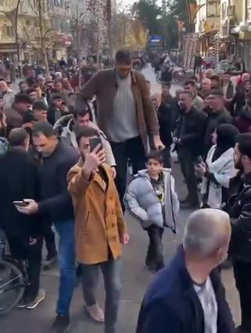 Turkish farmer who holds the GUINNESS WORLD RECORD for TALLEST LIVING MALE at 251 cm