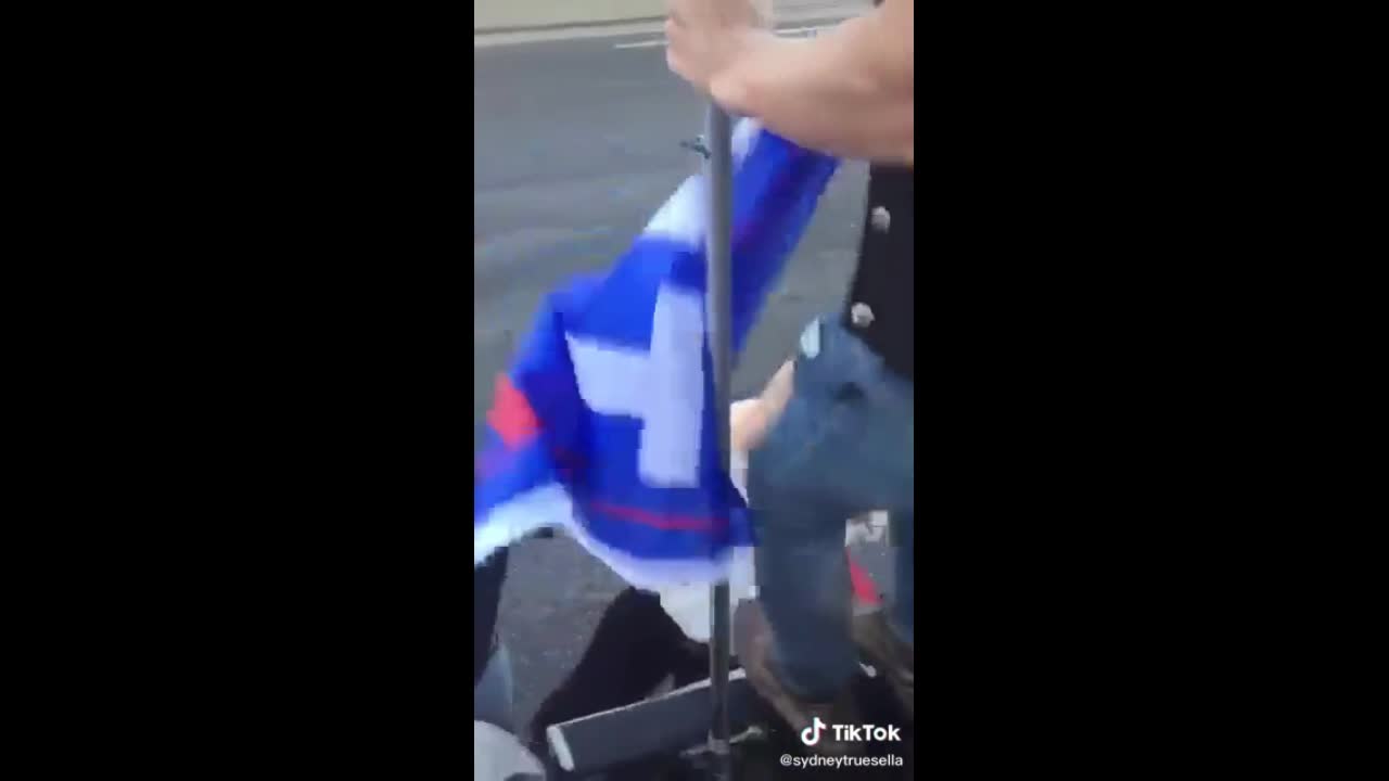 Deranged Leftist Fails Stealing Trump Flag And Returns To Tell Them All To Die