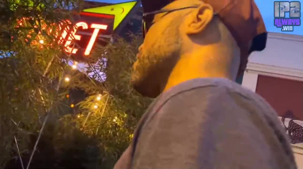 Flat Earth Boxer gets pressed by a customer at Comet Ping Pong