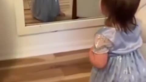 Baby In Blue Dress