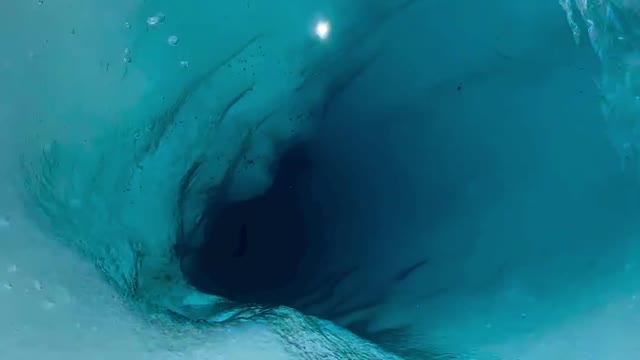 Don't fall into this giant ice tunnel in Alaska! It's on a very large glacier 🤯😍.