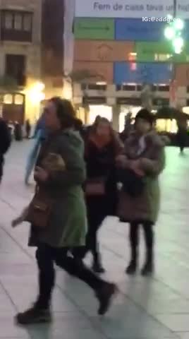 Man in wet suite yellow surf board