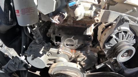 Isuzu 6BG1T engine water pump replacement, Link-Belt 210LX excavator