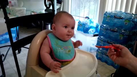 Baby can't stop dancing during lunchtime