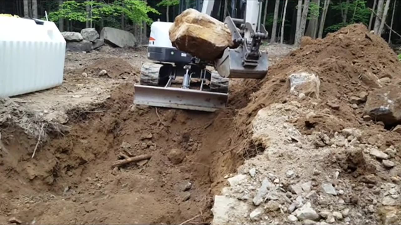 12 more inches.. breaking mountain with boukders#offgrid
