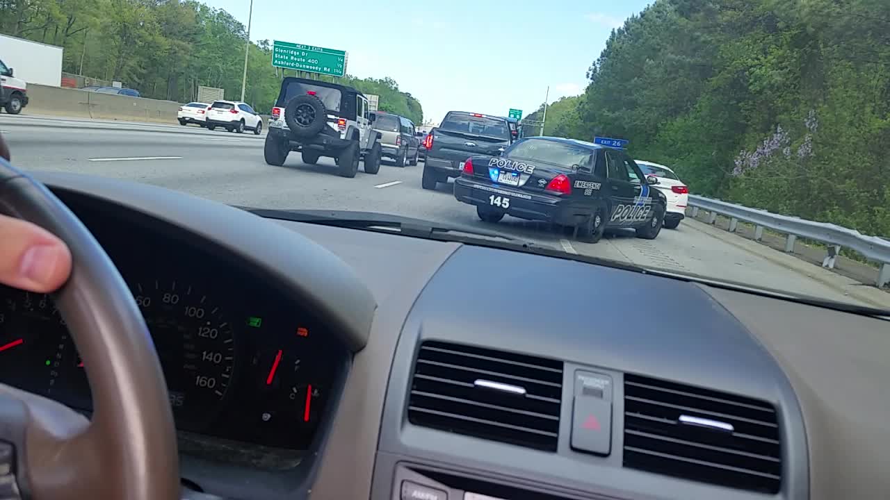 Impatient Driver Gets Pulled Over By The Police For Not Waiting In Traffic Jam