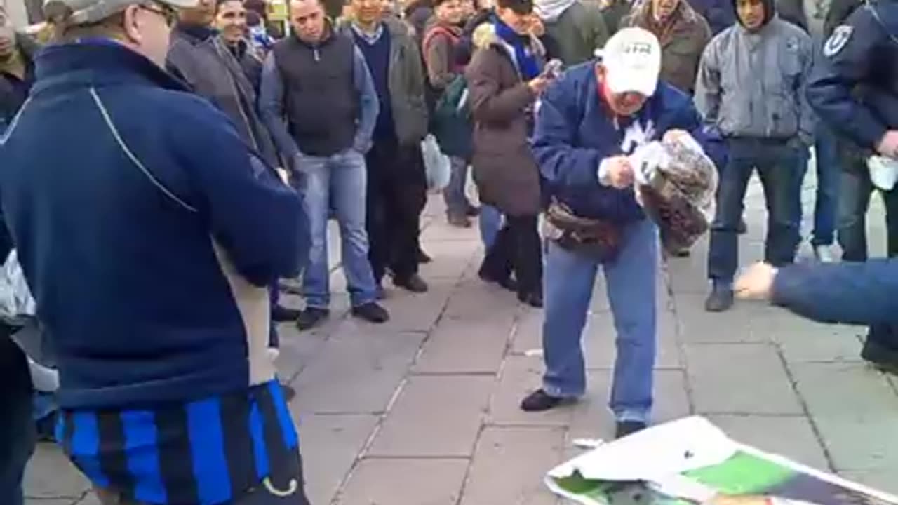 Milano ( Italia) Milan Italy Inter fans making fun of Milan player.