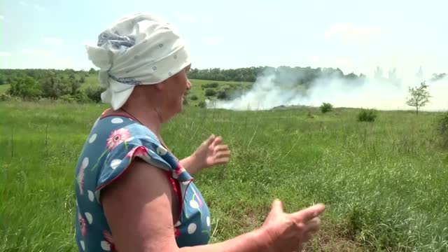 Villagers left to put out fires as war threatens their crops