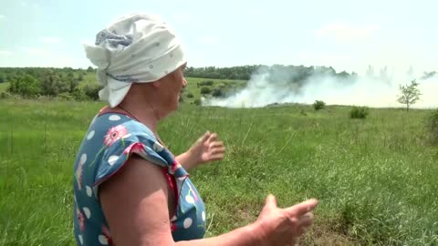 Villagers left to put out fires as war threatens their crops