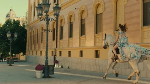 Beautiful Woman Riding a Horse