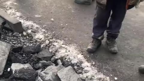 Ukrainians Immediately Get to Work After Drone Hits an Apartment Building in Kharkiv Overnight