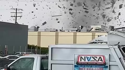 Tornado Blows Through Buildings