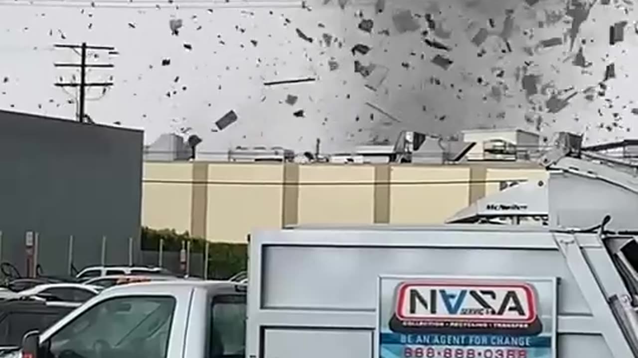 Tornado Blows Through Buildings