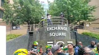 Scores of women arrive at the Johannesburg Stock Exchange in Sandton