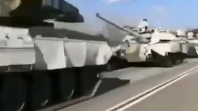 Russian tanks in winter paint go to the NWO zone