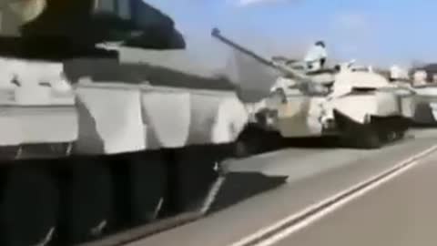 Russian tanks in winter paint go to the NWO zone