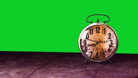 Clock animation on green background.