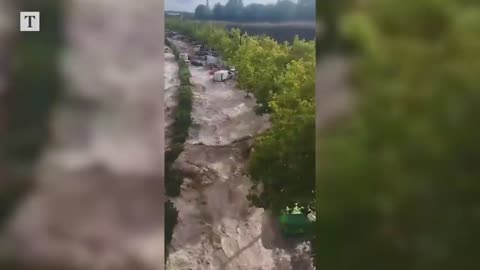 Cars washed away during heavy floods in Spain