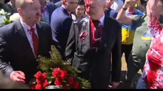 ⁣Russia's ambassador to Poland, Sergey Andreev, ⁣doused with red paint while at a cemetery