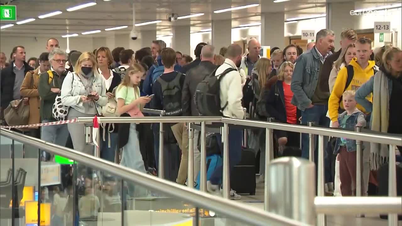 Chaos at Amsterdam's Schiphol airport due to staff shortages and number of passengers