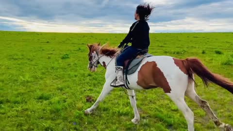 Riding a horse on the prairie