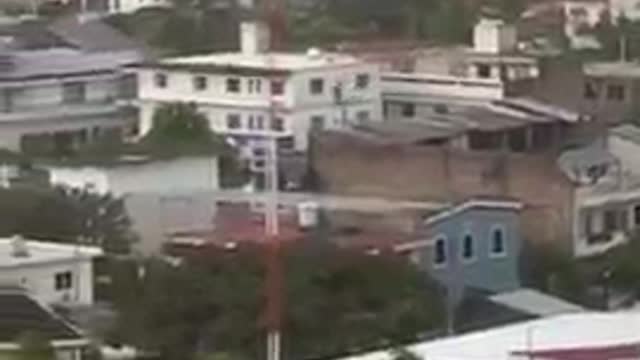 Parasailing Goes Wrong as Woman Lands Abruptly on Building's Rooftop Due to Rope Snap