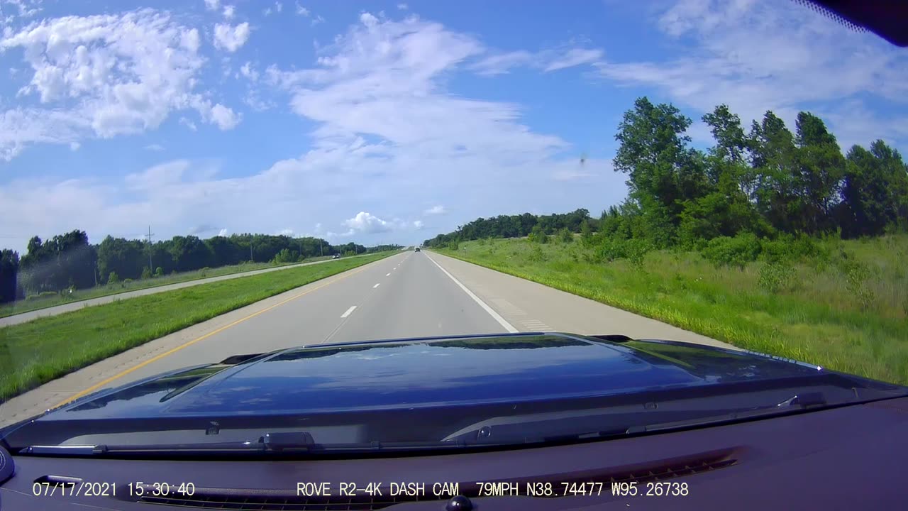 Deer crosses road