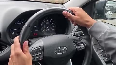 A habit of holding the steering wheel while driving