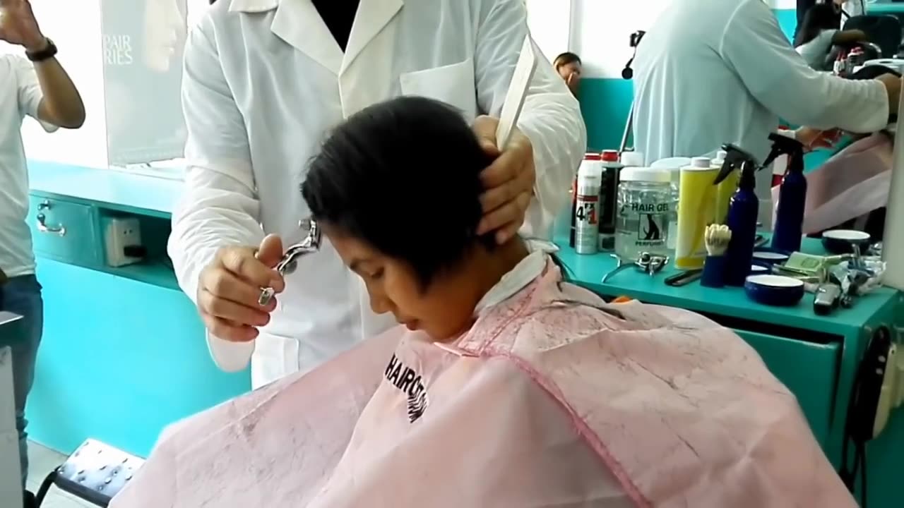 Girl haircut and headshave with clipper