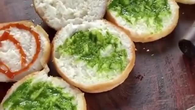 Person Prepares Indian Style Burgers