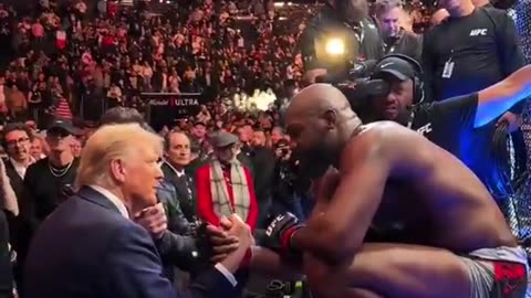 Jon Jones gives his belt to Trump