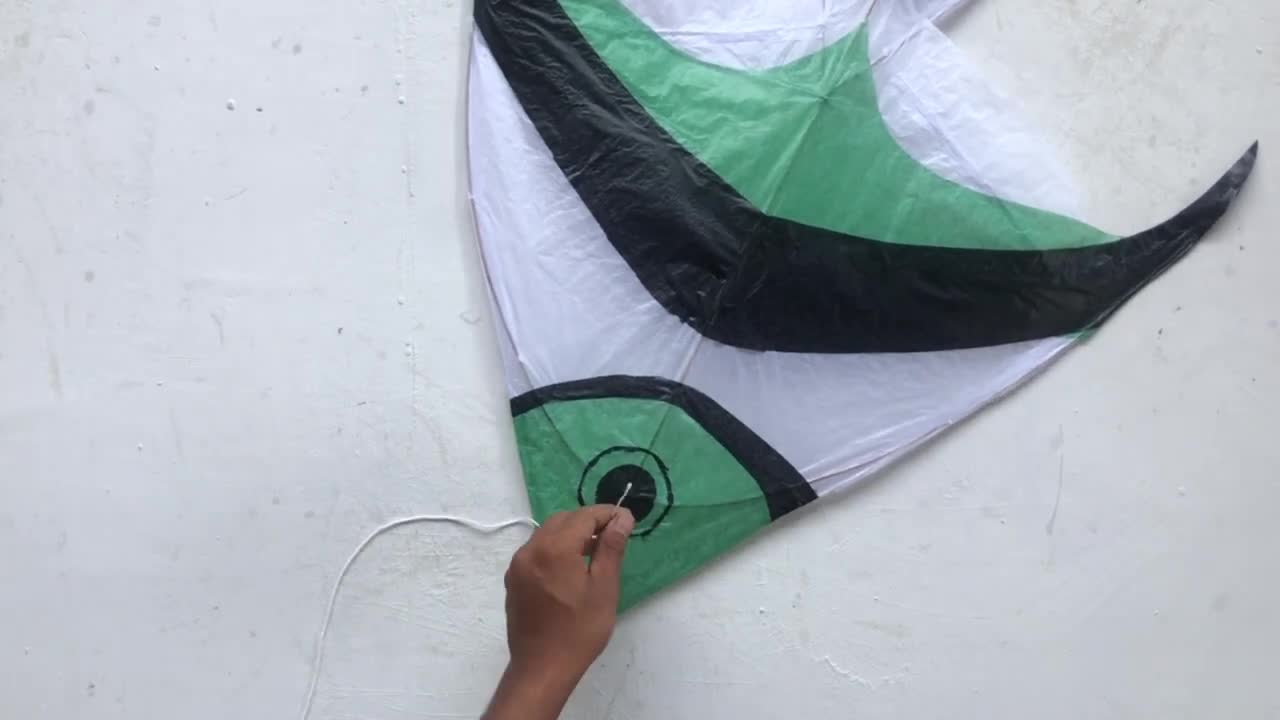 How to make a fish kite from a coconut stick