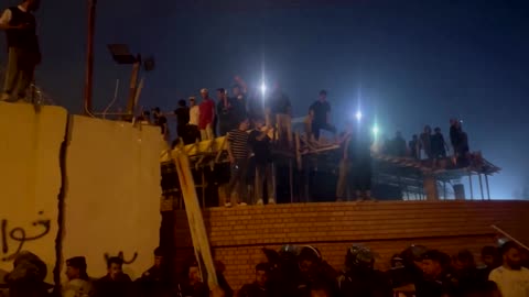 Iraqi protesters storm, set alight Swedish embassy