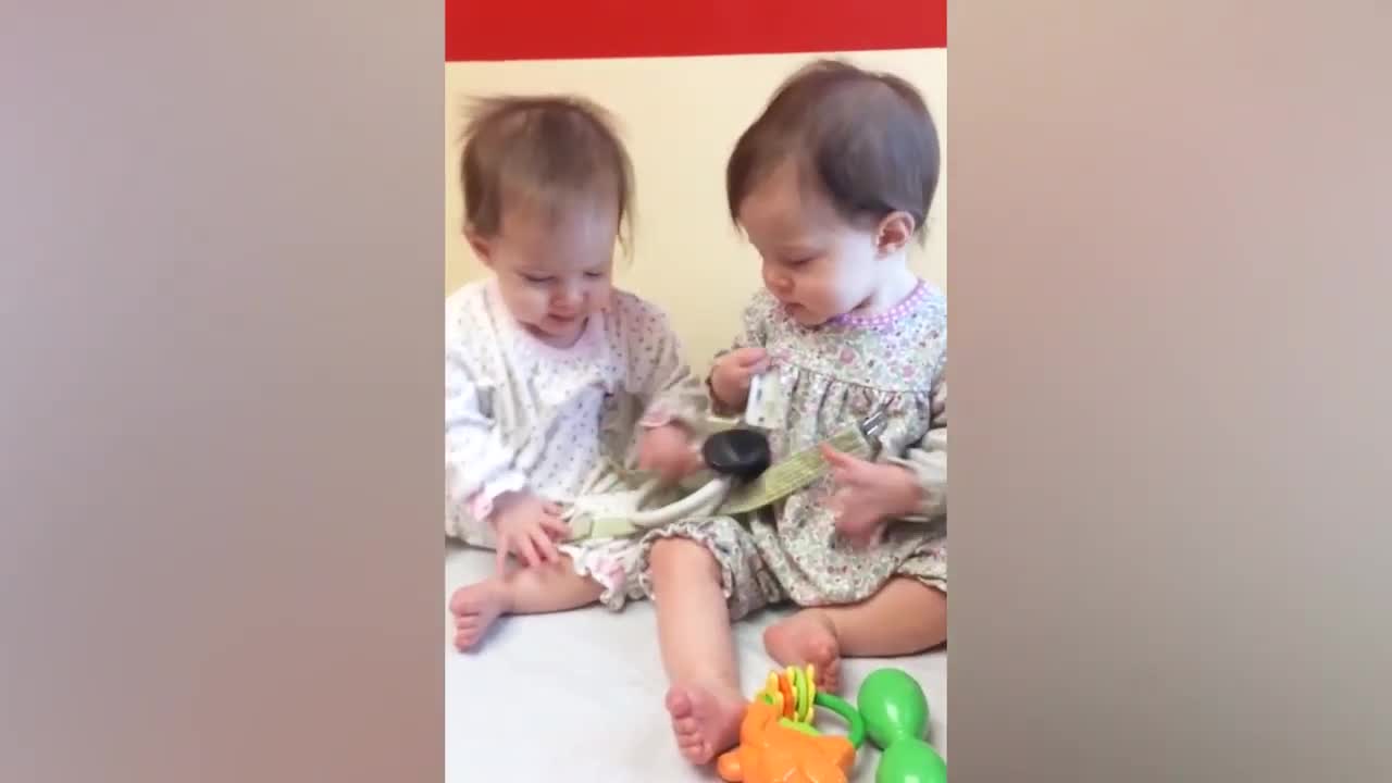 Funny Twins Babies Playing Together