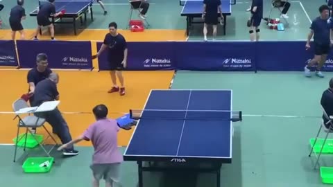 ref gets taken out by ping pong bat.