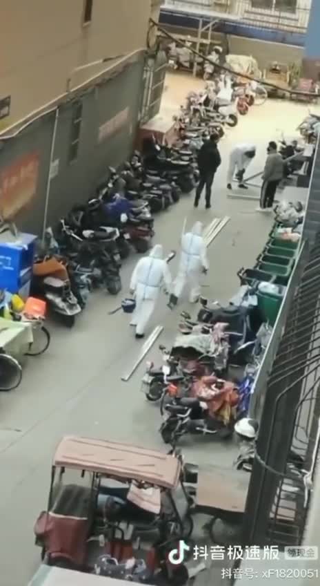 An apartment building in Chengdu in China… the government is welding the entrance door