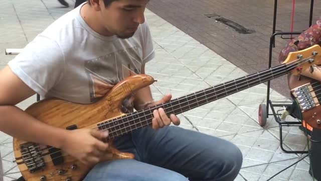 Bassists Rock the Streets of Santigo