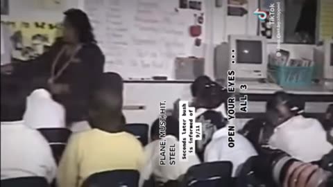 Bush watches children read. Listen to the words.