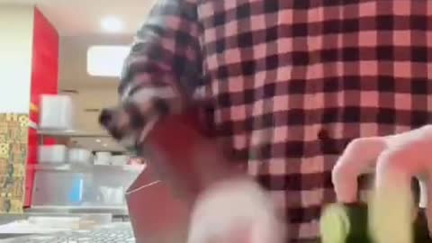 Man Shows Impressive Fast Movements While Chopping Cucumber