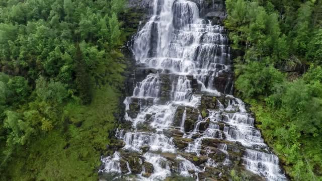 aerial footage from tvindefossen waterfall from the birds eye view norway