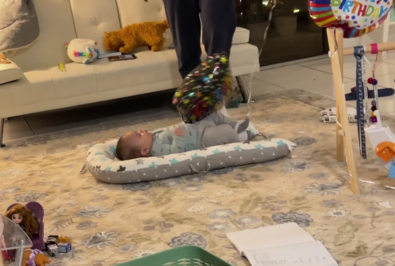 Baby Plays with Balloon