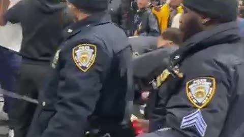 ILLEGALS ATTACK NYPD TRYING TO MAKE AN ARREST AT NYC MIGRANT SHELTER