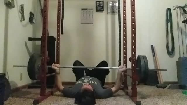 Reverse grip floor press