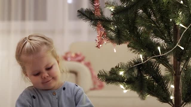 santa claus giving gift to little girl